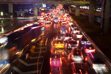Fototapeta na wymiar Abstract blur traffic jam at night in Bangkok
