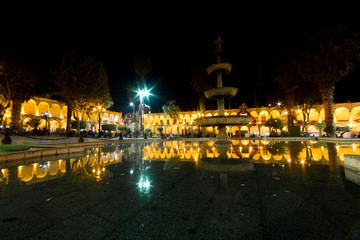 Fototapeta premium Plaza de Armas reflections at night
