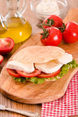 Puccia bread with mozzarella and tomato. 