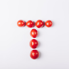 Red tomatoes in the shape of the letter 