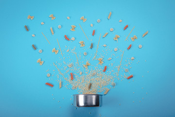 Dishes for eating with different types of spaghetti various forms near it. Food Concept. Components...