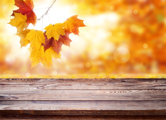 Wood table top on shiny bokeh gold background - can be used for display or montage your products