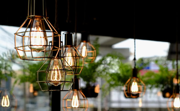 Lamps were installed to provide light as well as interior decoration at a restaurant. - Powered by Adobe