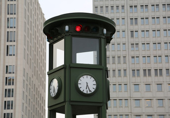 Naklejka premium Old traffic light in the large East Berlin square called Potsdam