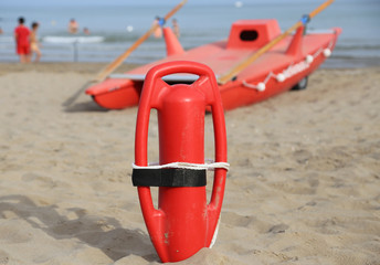 Fototapeta premium lifebuoy and lifeguard rescue boat