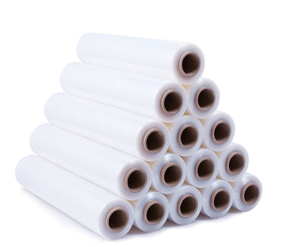 A pyramid stacked with rolls of stretch film on a white background.