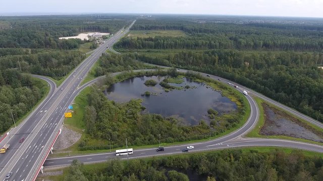 Highway round road junction, aerial view video clip Ultra HD 4K 3840x2160