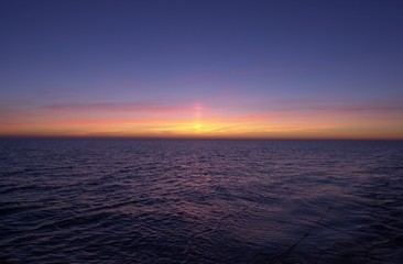 Fototapeta na wymiar Wschód słońca nad morzem
