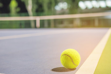 Tennis ball at the hard court line