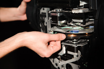 The equipment repair engineer diagnoses the breakdown of light equipment