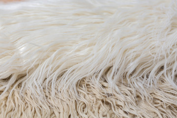 Artificial fur background white, brown, beige, cream
