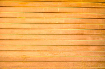 garage bright wood door close up photo