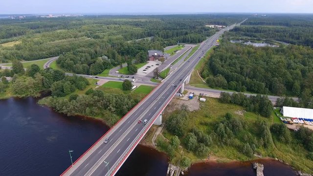 Highway on bridge over river, aerial view video clip Ultra HD 4K 3840x2160