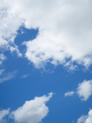Obraz premium Blue bright sky with white clouds on sunny day. The vast blue sky and clouds sky.Beautiful background. Beautiful blue sky.