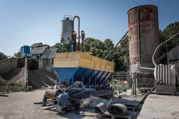 The machine for the production of cement blocks in a small cement factory.