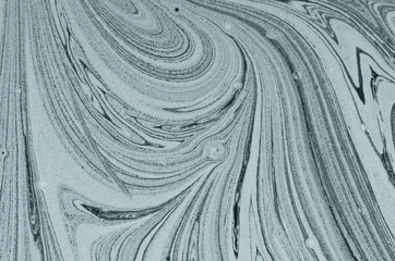Fototapeta premium The abstract background of ink mixing.