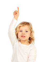 Adorable baby with blond long hair raising the hand