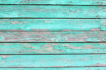 Old wooden fence. Texture of an old unpainted wood.