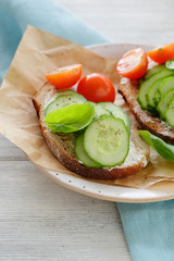 Two breakfast toast with veggies