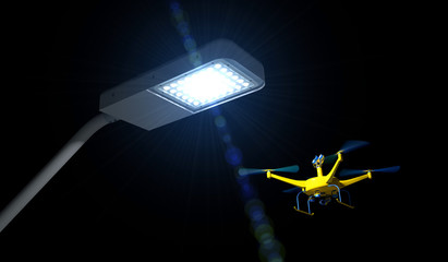 3D render of a UAV drone with top-mounted camera inspecting an LED street light at night. Fictitious UAV and street lamp, dark night time sky, lens flare and motion blur for dramatic effect.