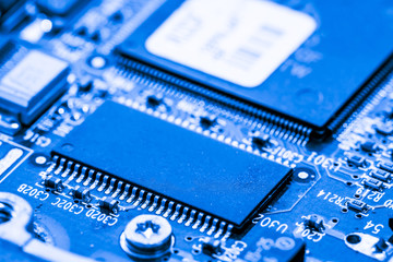 Close up of semiconductor Electronic Circuits in Technology on  
Mainboard background (Main board,cpu motherboard,logic board,system board or mobo)
