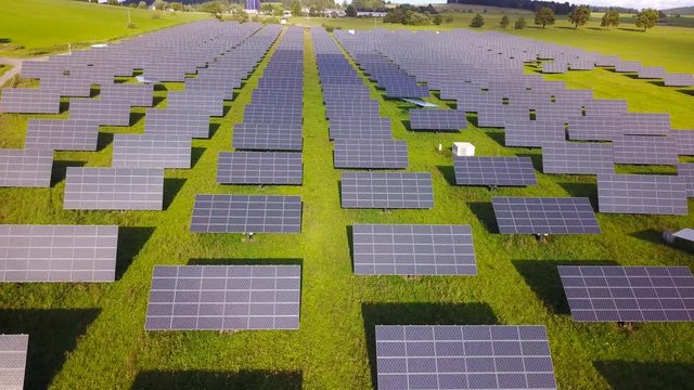 Aerial footage - Solar panels spread across a Solar farm