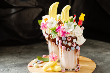 Fresh tasty cocktail with berries, sweets and flowers