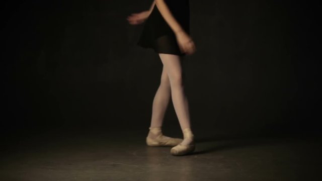 Ballerina Dancing In Studio