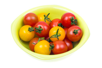 Yellow and red ripe small tomatoes
