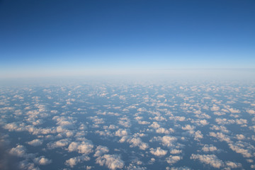 Beautiful aerial view on clouds from a plane over an Iceland. 