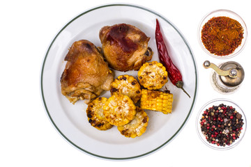 Dish of corn and turkey on grill