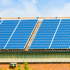 Solar panel on a roof of a house.  alternative energy photovoltaic solar panels
