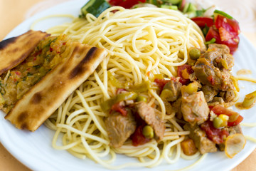 Plate with pasta and meat
