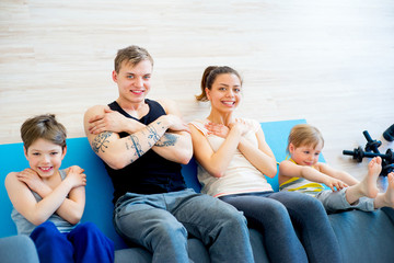 Family doing sit ups together