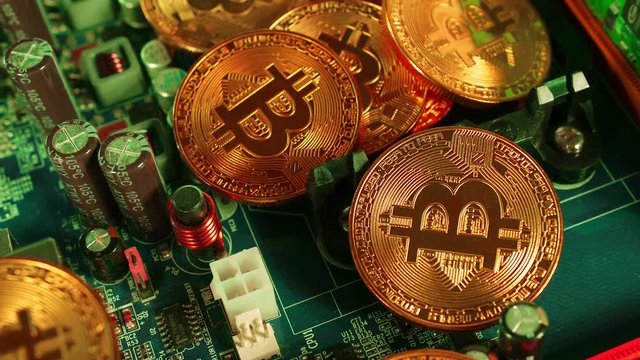 Crypto currency Gold Bitcoin - BTC - Bit Coin. Macro shots crypto currency Bitcoin coins rotating. Holomatrix style. Seamless looping.