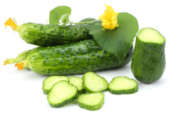 cucumber with sliced cucumber and leaf isolated on white background