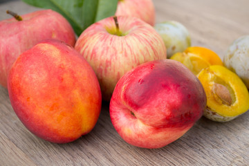 Fototapeta na wymiar peaches apples and plums