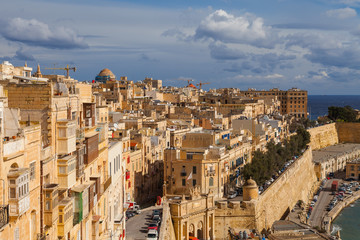 Fototapeta na wymiar Malta - Aerial view of the ancient city Valletta on a sunny day with blue sky
