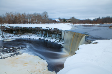 Frozen waterfall in winter time. Estonia.