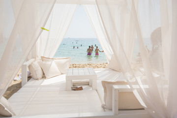 Baldachin, cabana bed on beach - view, sunshine © Ruzica