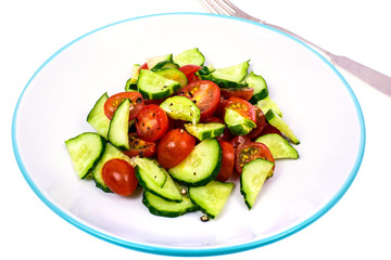 Healthy eating. Light dietary salad of fresh cucumbers and tomatoes