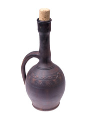 Clay pitcher for wine on white background