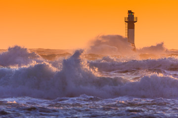 Obraz na płótnie Canvas lighthouse in sunset