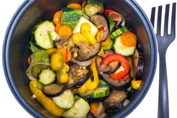 Stewed seasonal vegetables in saucepan. Studio Photo