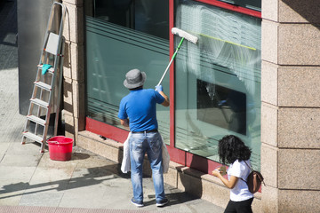window cleaner working