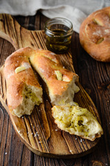 Focaccia with olive oil, herbs and garlic.