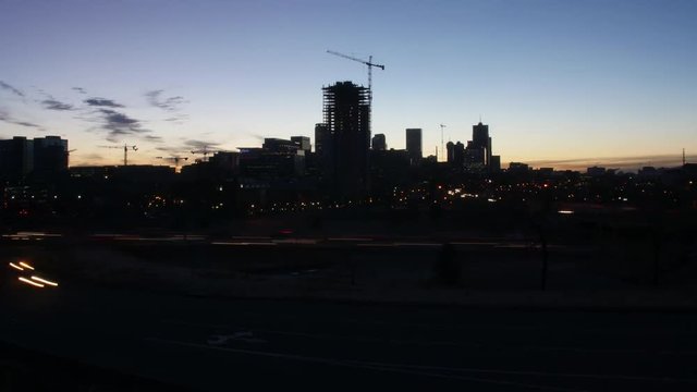 Denver Skyline with Interstate Traffic Timelapse