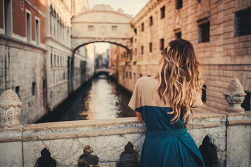 Woman in front of Bridge of Sighs in Venice © Nejron Photo