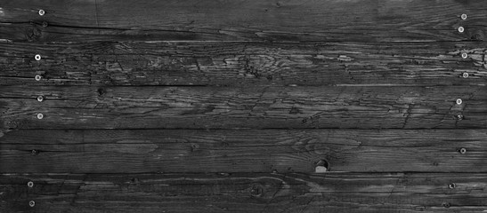 Naklejka premium black, dark, gray, weathered, rough, old, wooden surface