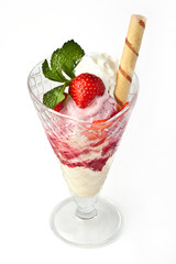 Delicious strawberry ice-cream dessert in glass isolated on white
